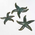 Margery Torrey, Starfish (set of 3), 2019, Bronze, various sizes