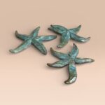 Margery Torrey, Starfish (set of 3), 2019, Bronze, various sizes