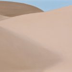Georgia O'Keeffe (1887 - 1986), Untitled (Sand Hills), oil on canvasboard, 9 1/2 x 13 1/2 inches